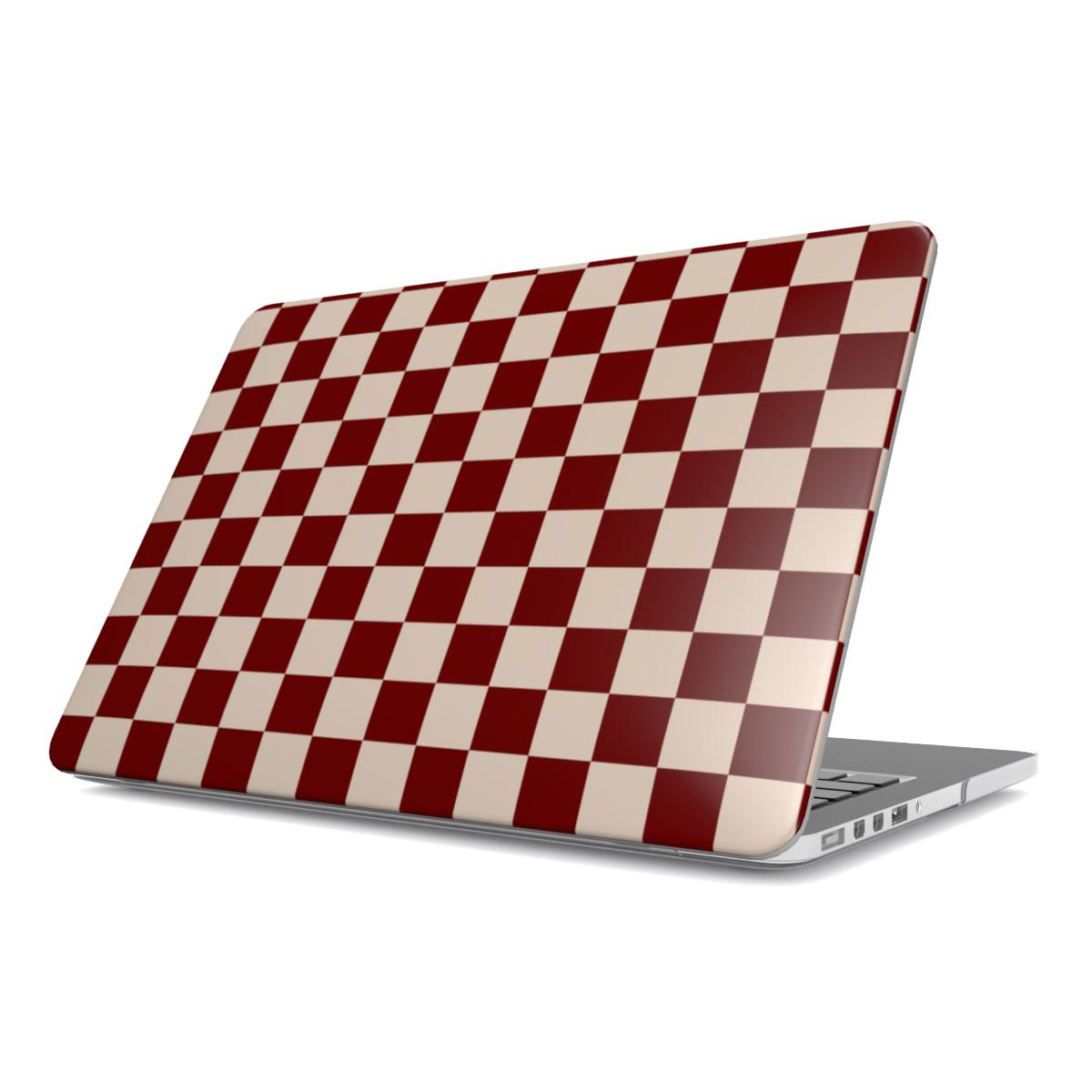 Laptop with a Burgundy and beige checkered design on aa white background.