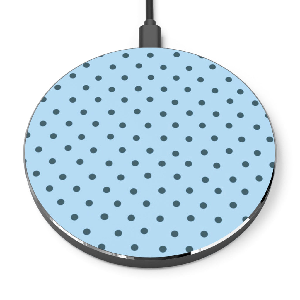 Round wireless charging pad with blue polka dot pattern on a white background