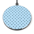 Round wireless charging pad with blue polka dot pattern on a white background