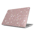Laptop with a red and white checkered cover on a white background