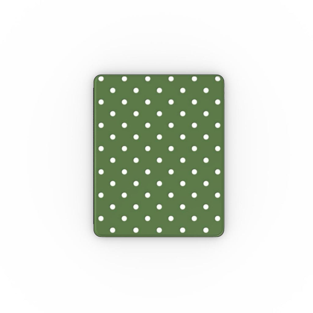 Green iPad case with white polka dots on a white background