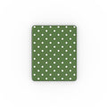 Green iPad case with white polka dots on a white background