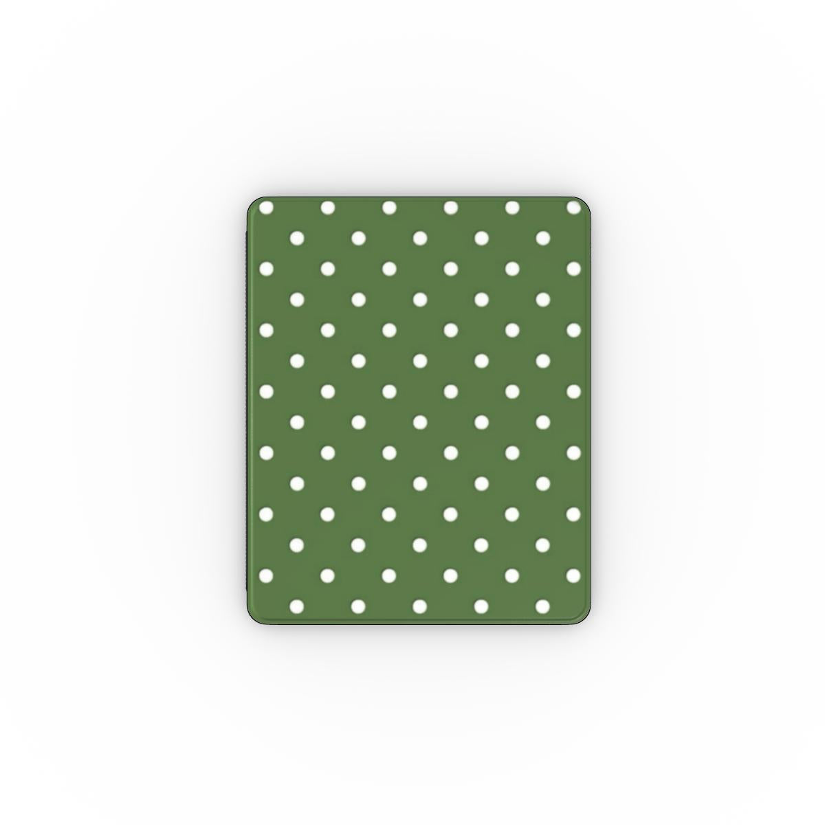 Green iPad case with white polka dots on a white background